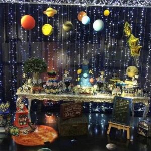 Mesa de postres fiesta temática de astronautas